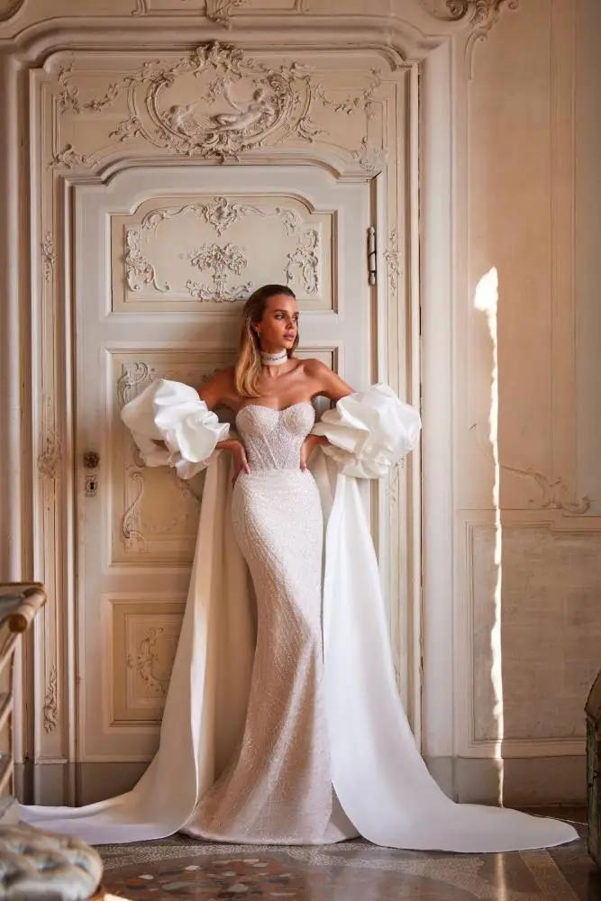 The Reign of Statement Sleeves in 2024 Wedding Gown Trends Image