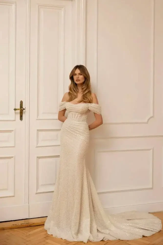 Less is More: The Subtle Beauty of Simple Wedding Gowns Image
