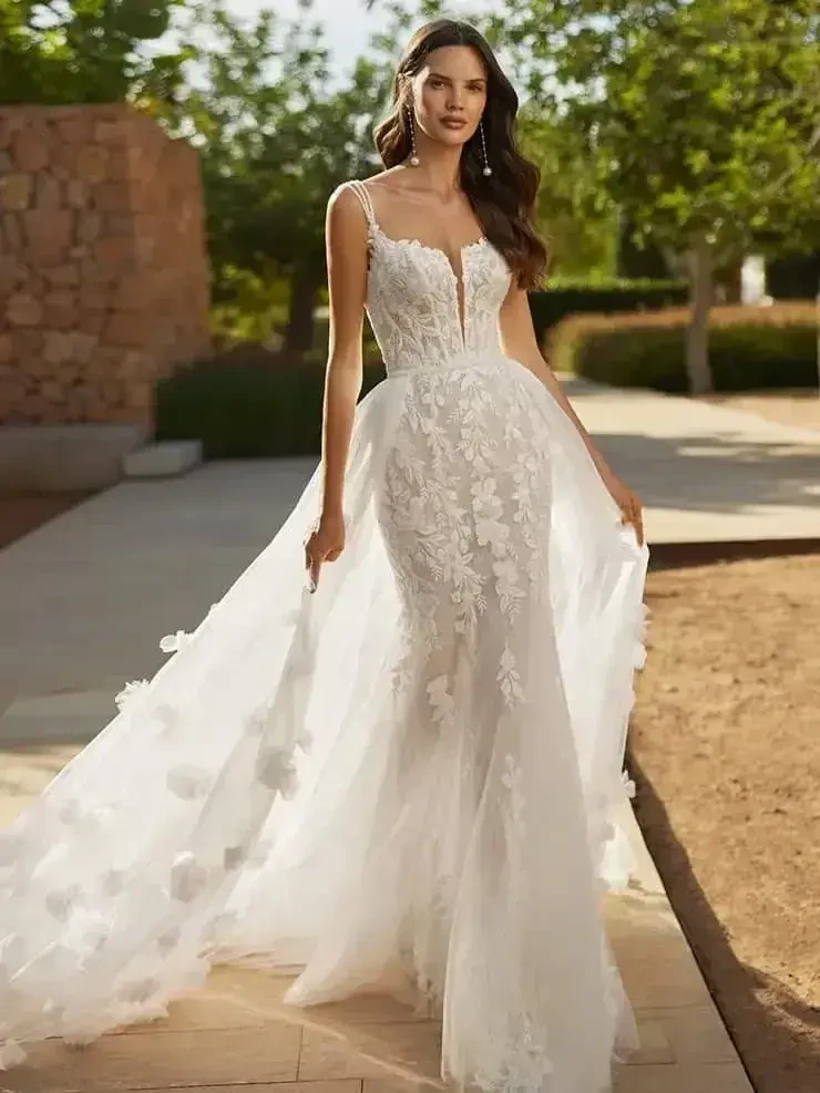 Model wearing a white gown